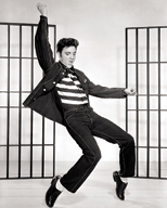 black and white photo of Elvis Presley dancing